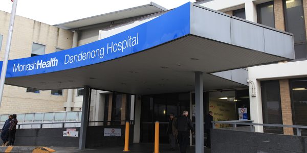 Monash Health Dandenong Hospital entrance with people traffic
